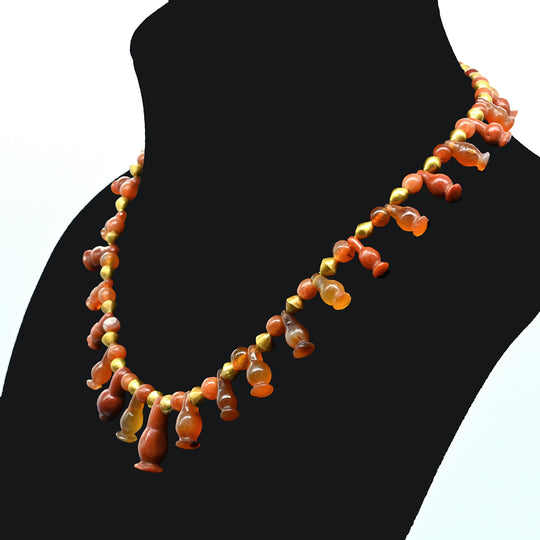 An Egyptian Carnelian, Red Jasper and Gold Bead Necklace, late 18th Dynasty, ca. 1350 - 1295 BCE