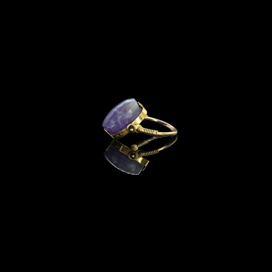 An Egyptian Amethyst Scaraboid, Middle Kingdom, ca. 2040 - 1783 BCE