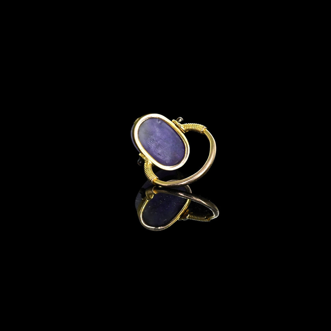 An Egyptian Amethyst Scaraboid, Middle Kingdom, ca. 2040 - 1783 BCE