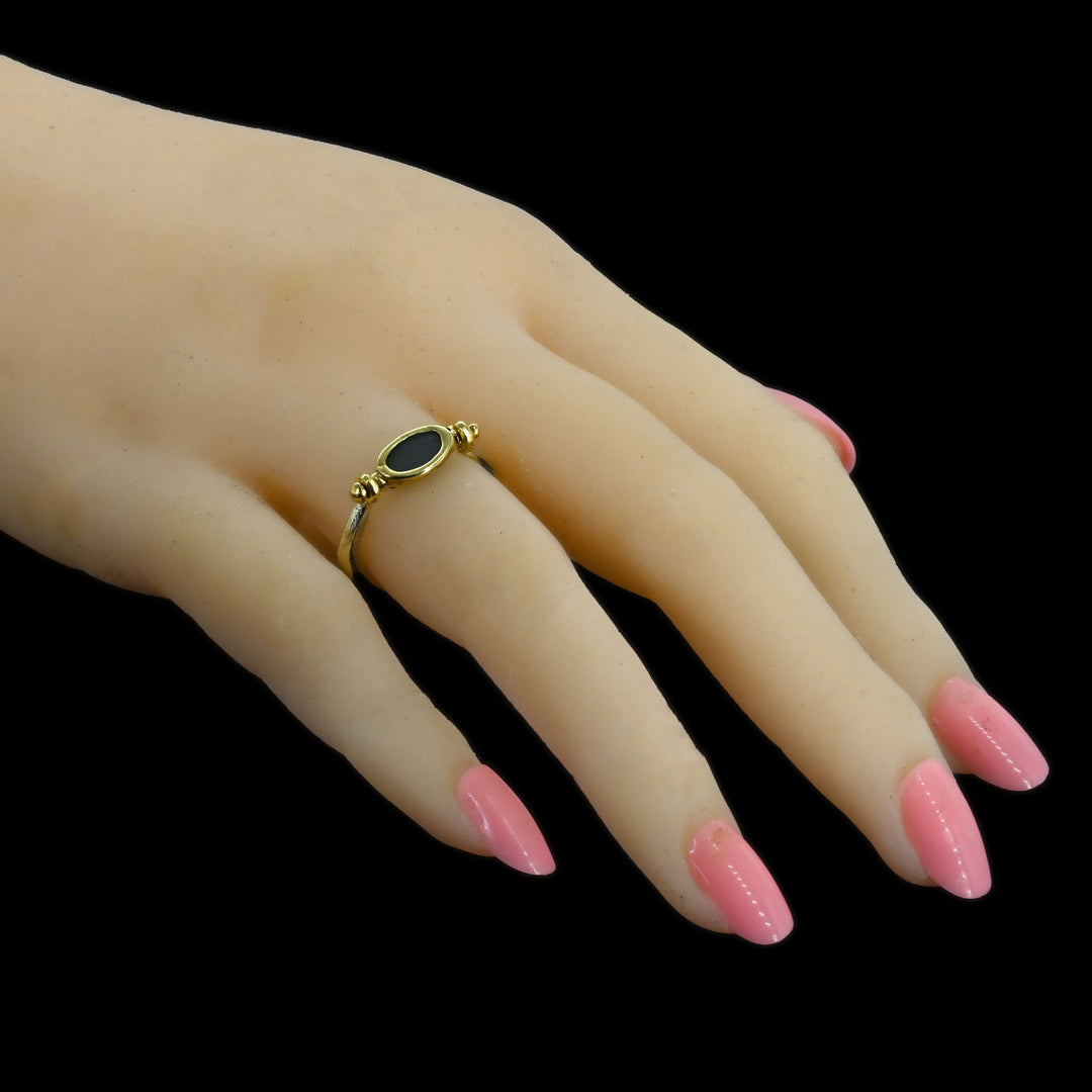 An Egyptian Scaraboid Gold Swivel Ring, New Kingdom, 18th Dynasty, ca. 1550 - 1295 BCE