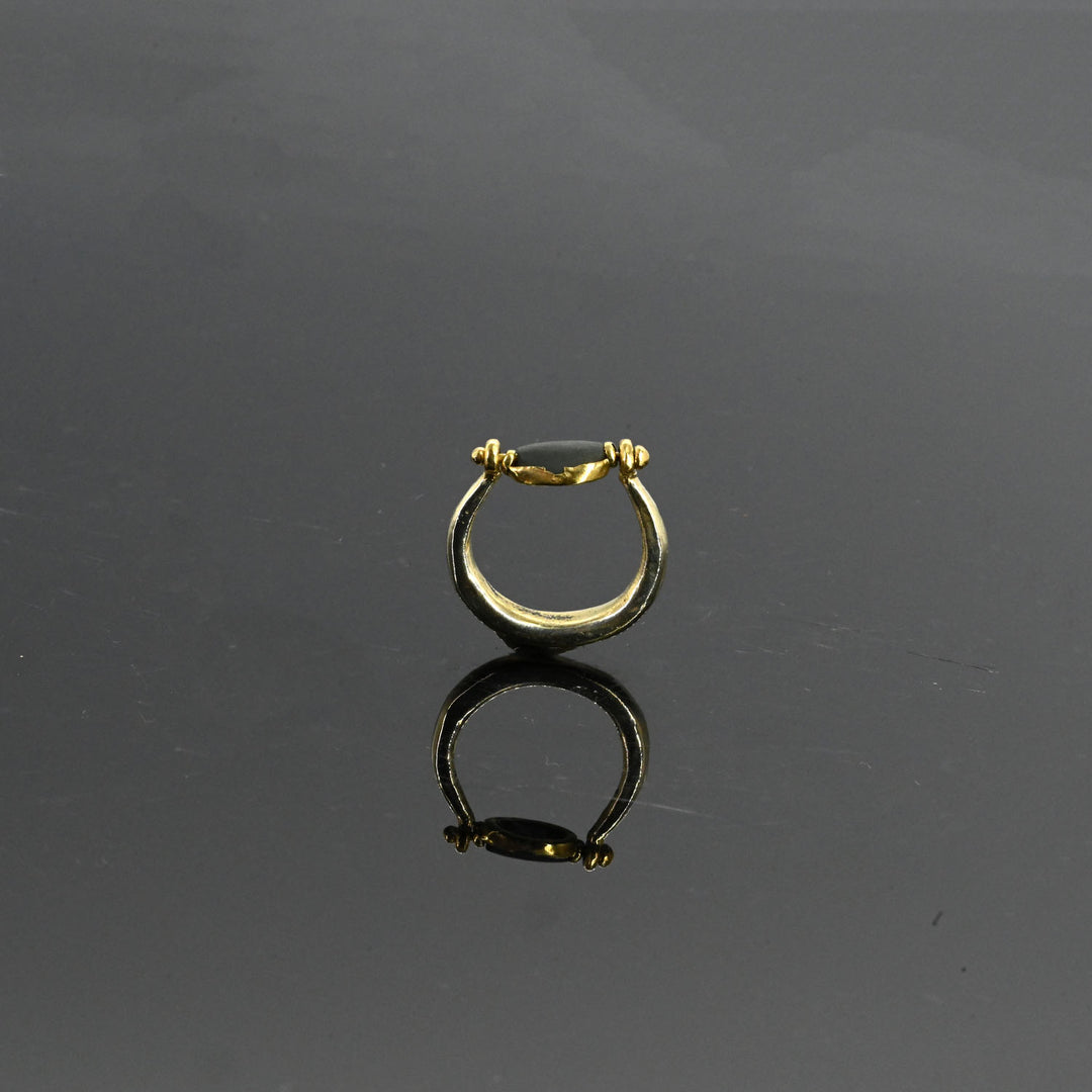 An Egyptian Scaraboid Gold Swivel Ring, New Kingdom, 18th Dynasty, ca. 1550 - 1295 BCE