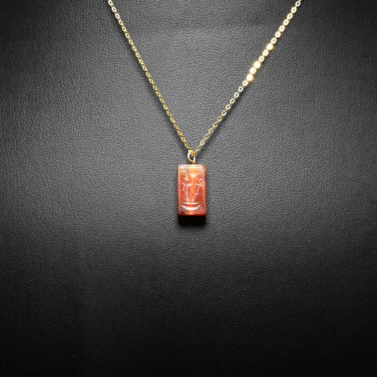 A rare Egyptian Royal Carnelian Pendant for Amenhotep III, 18th Dynasty, reign of Amenhotep III, ca. 1390 – 1352 BCE