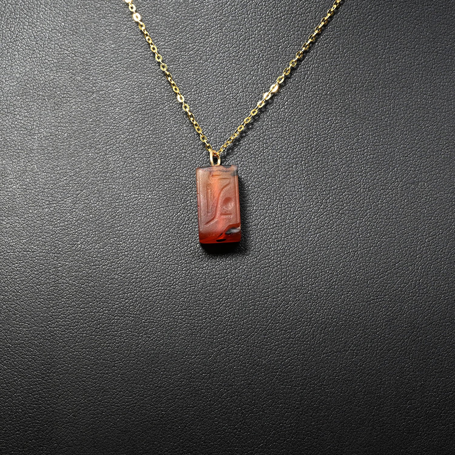 A rare Egyptian Royal Carnelian Pendant for Amenhotep III, 18th Dynasty, reign of Amenhotep III, ca. 1390 – 1352 BCE