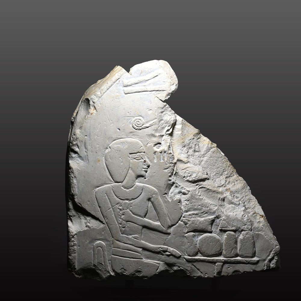 An Egyptian Limestone Stele Fragment, New Kingdom, early 18th Dynasty, Reign of Ahhotep I (c. 1575-1530 BCE) - Amenhotep I (c. 1525-1504 BCE)