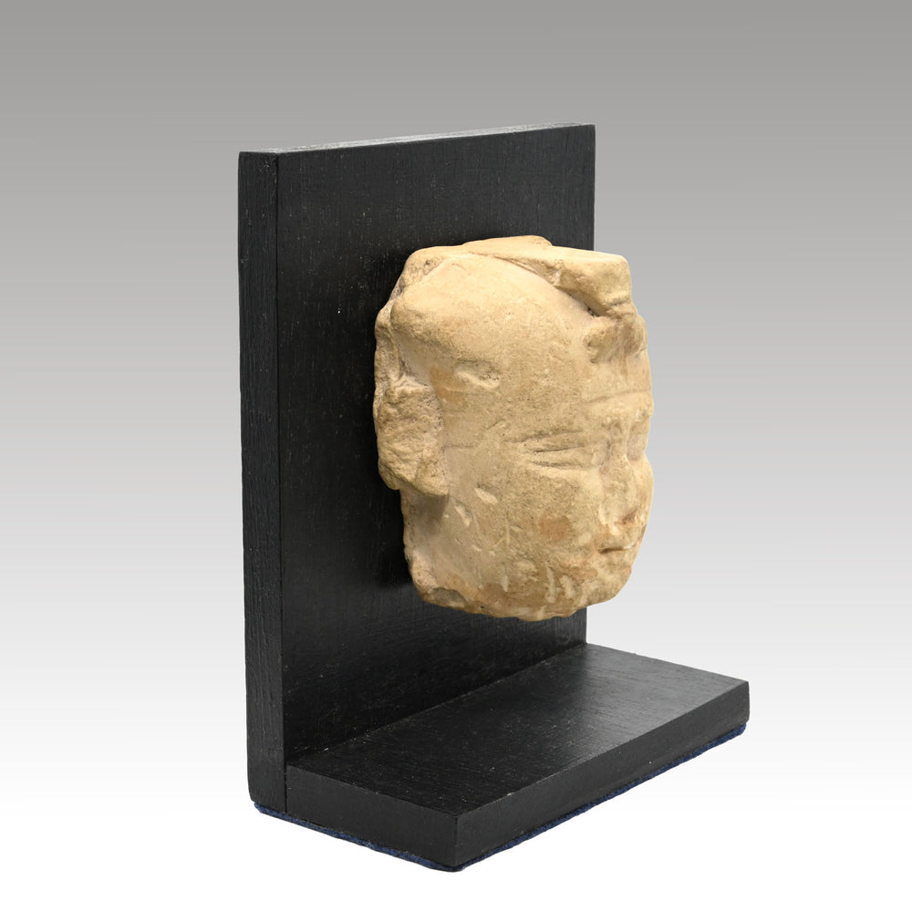 A Published Egyptian Limestone Trial Piece of a Royal Male Head, Ptolemaic Period, ca 332 - 30 BCE