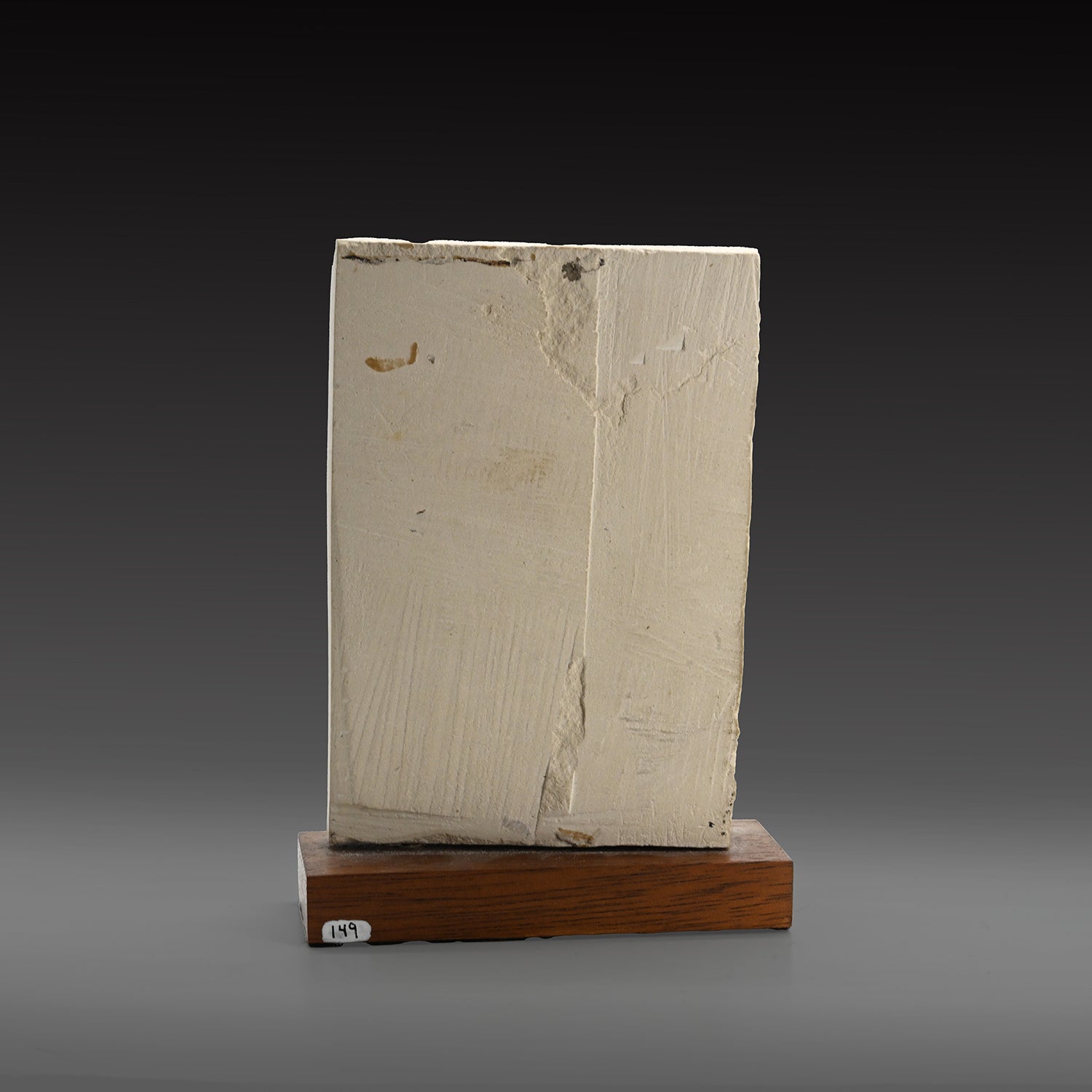 A Published Egyptian Limestone Fragment with Kneeling Figure, Old Kingdom, ca. 2200 BCE