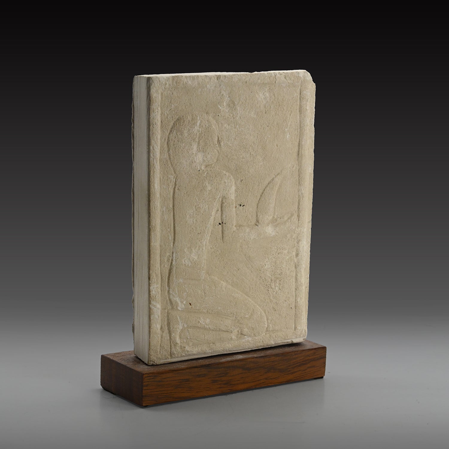 A Published Egyptian Limestone Fragment with Kneeling Figure, Old Kingdom, ca. 2200 BCE