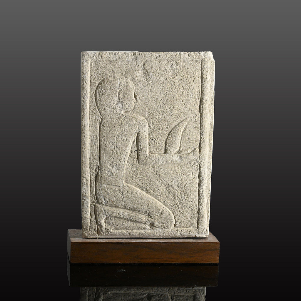 A Published Egyptian Limestone Fragment with Kneeling Figure, Old Kingdom, ca. 2200 BCE