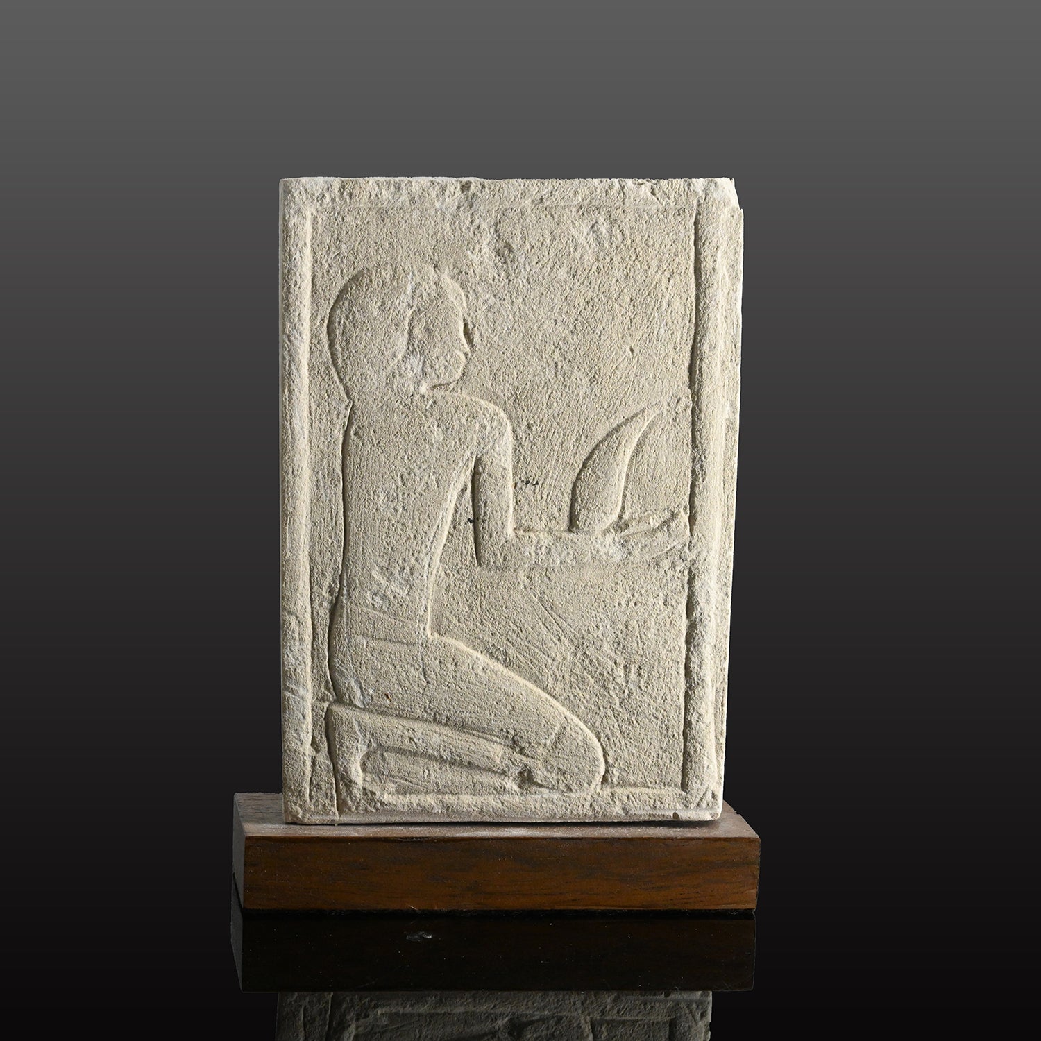 A Published Egyptian Limestone Fragment with Kneeling Figure, Old Kingdom, ca. 2200 BCE
