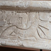 An Egyptian Limestone Relief fragment with Wedjet Eye and Anubis, New Kingdom, 18th Dynasty, ca. 1540 - 1292 BCE