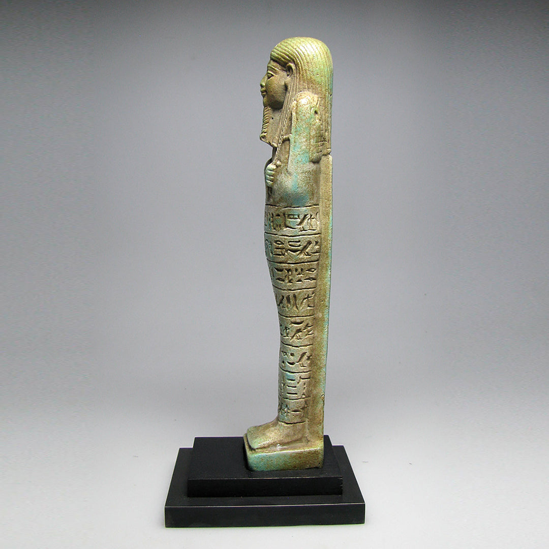 A fine Egyptian Faience Ushabti for Steward of the Treasury, Psamtik, called Iahmes, 26th Dynasty, 664 - 525 BCE
