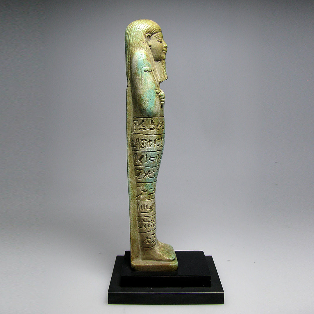 A fine Egyptian Faience Ushabti for Steward of the Treasury, Psamtik, called Iahmes, 26th Dynasty, 664 - 525 BCE