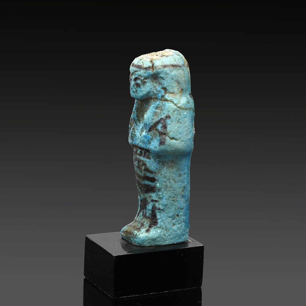 An Egyptian Turquoise Faience Shabti, Third Intermediate Period, 22nd Dynasty, ca. 945 - 713 BCE