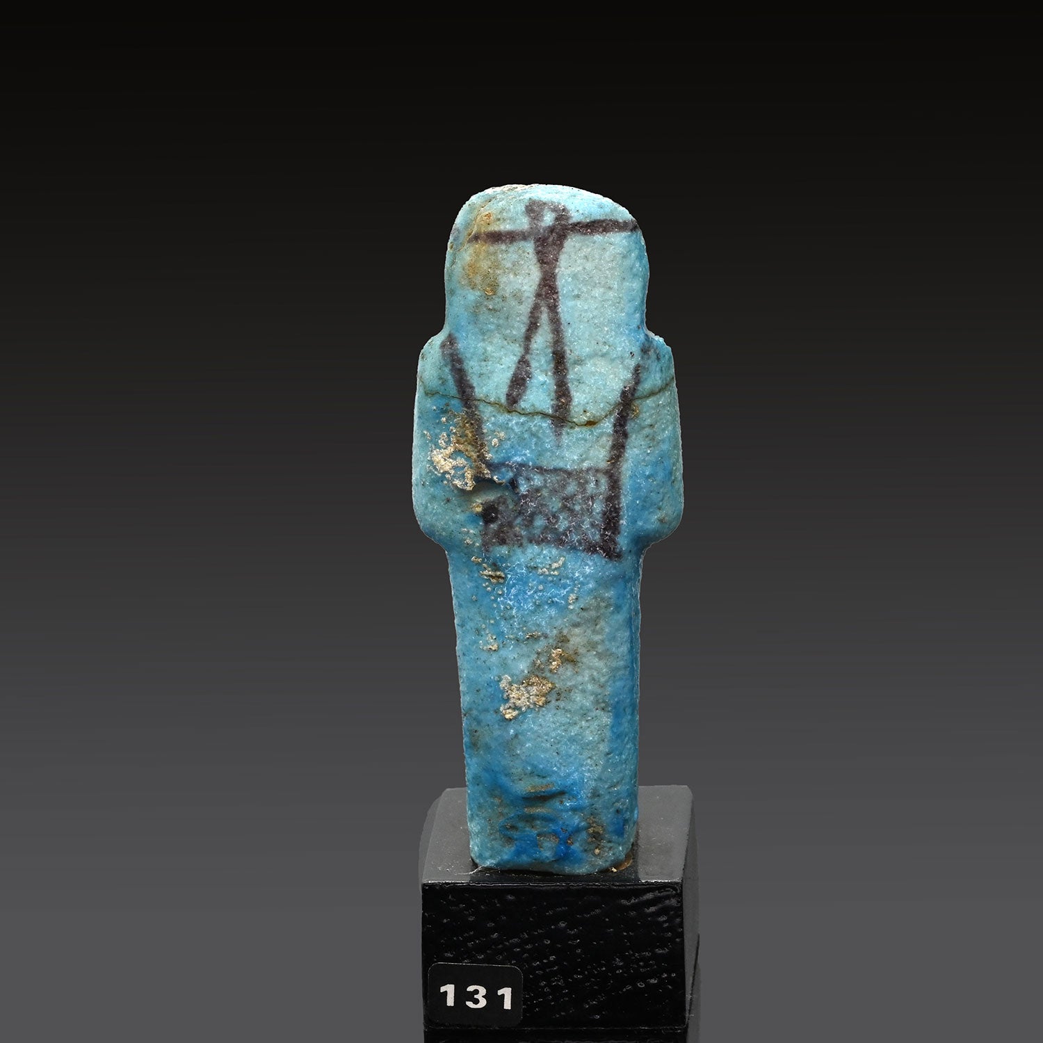 An Egyptian Turquoise Faience Shabti, Third Intermediate Period, 22nd Dynasty, ca. 945 - 713 BCE