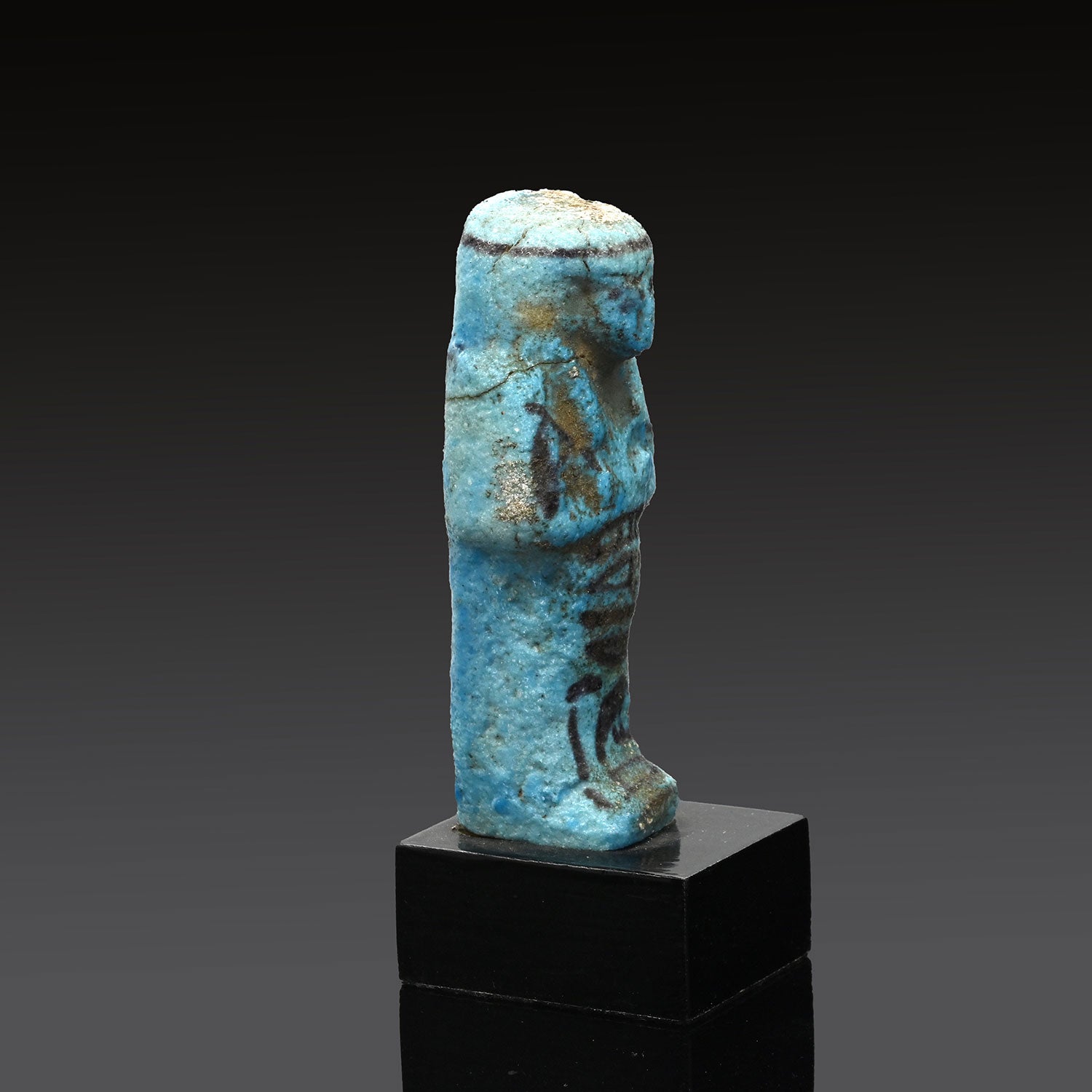 An Egyptian Turquoise Faience Shabti, Third Intermediate Period, 22nd Dynasty, ca. 945 - 713 BCE