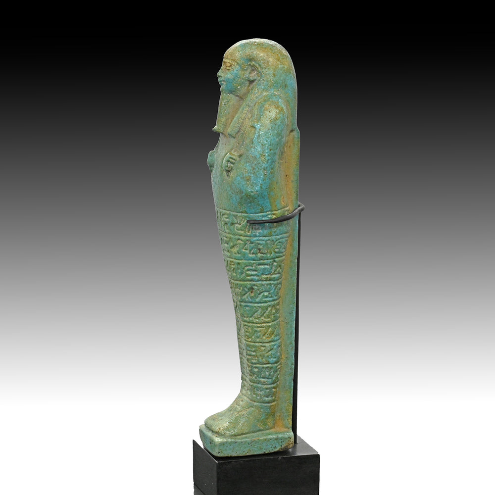 A fine Egyptian Faience Ushabti for Paaboumeh, Late Period, 26th Dynasty, ca. 664 - 525 BCE