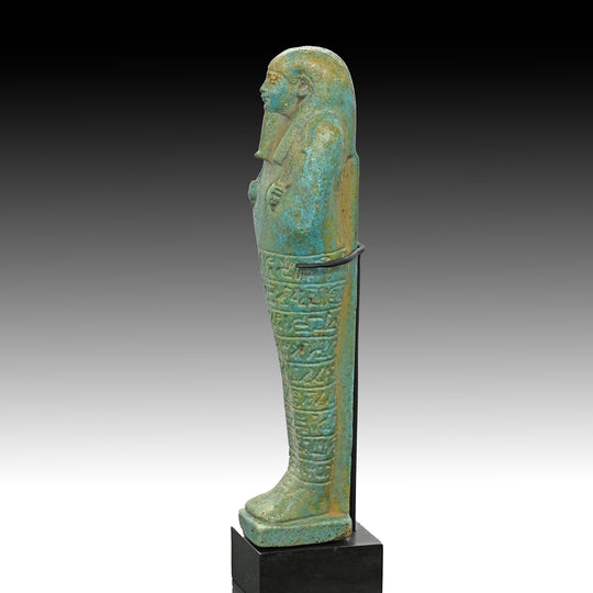 A fine Egyptian Faience Ushabti for Paaboumeh, Late Period, 26th Dynasty, ca. 664 - 525 BCE