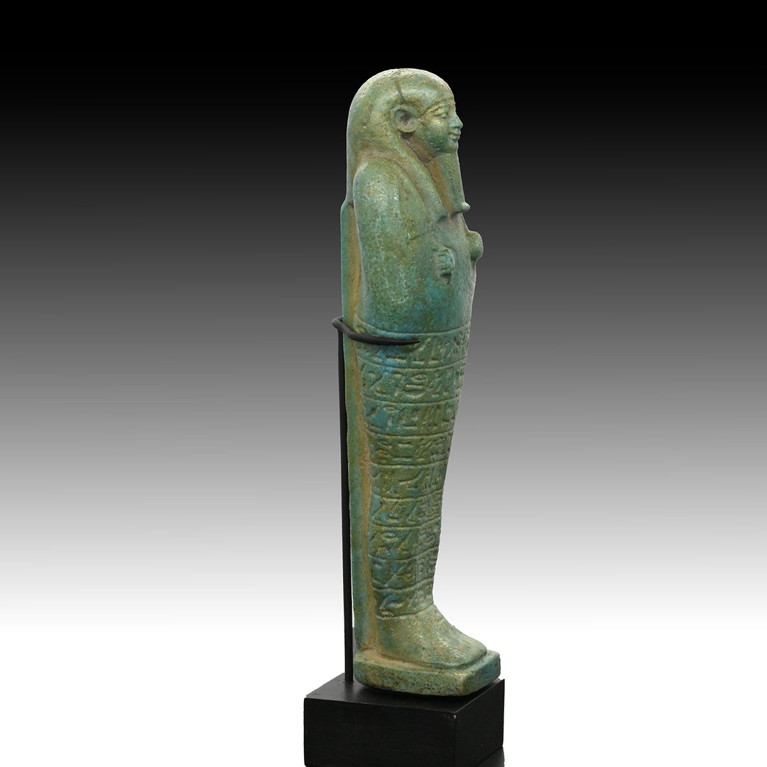 A fine Egyptian Faience Ushabti for Paaboumeh, Late Period, 26th Dynasty, ca. 664 - 525 BCE