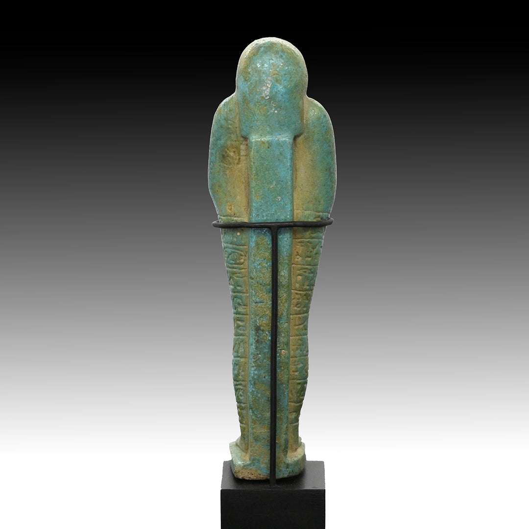 A fine Egyptian Faience Ushabti for Paaboumeh, Late Period, 26th Dynasty, ca. 664 - 525 BCE