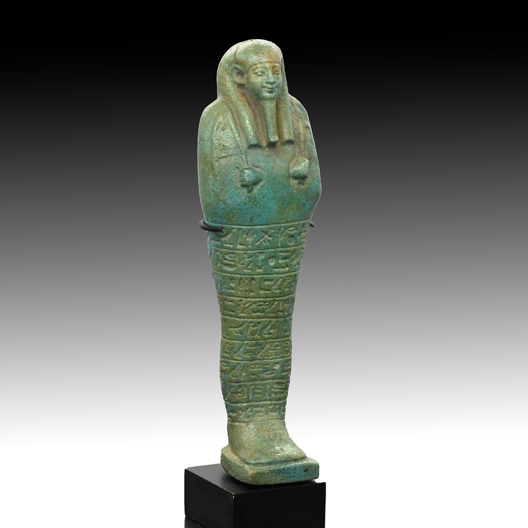 A fine Egyptian Faience Ushabti for Paaboumeh, Late Period, 26th Dynasty, ca. 664 - 525 BCE