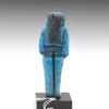 A Royal Egyptian bright blue glazed composition shabti for Princess AstEmKhebit, 21st Dynasty, Cache II, ca. 1069 - 945 BCE