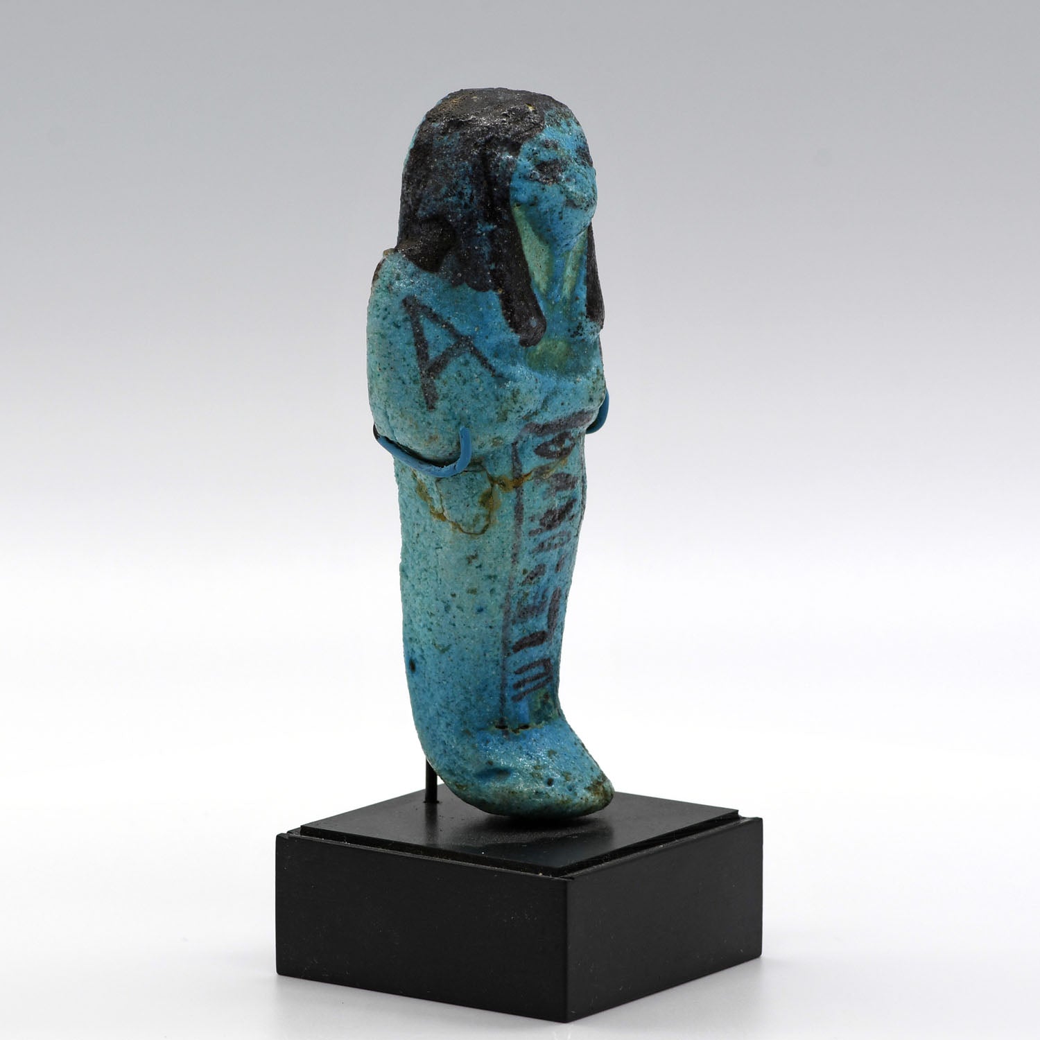 An Egyptian bright blue glazed shabti for Meret-Amun, 21st Dynasty, Thebes, Deir el Bahri Cache II, ca. 990 - 970 BCE