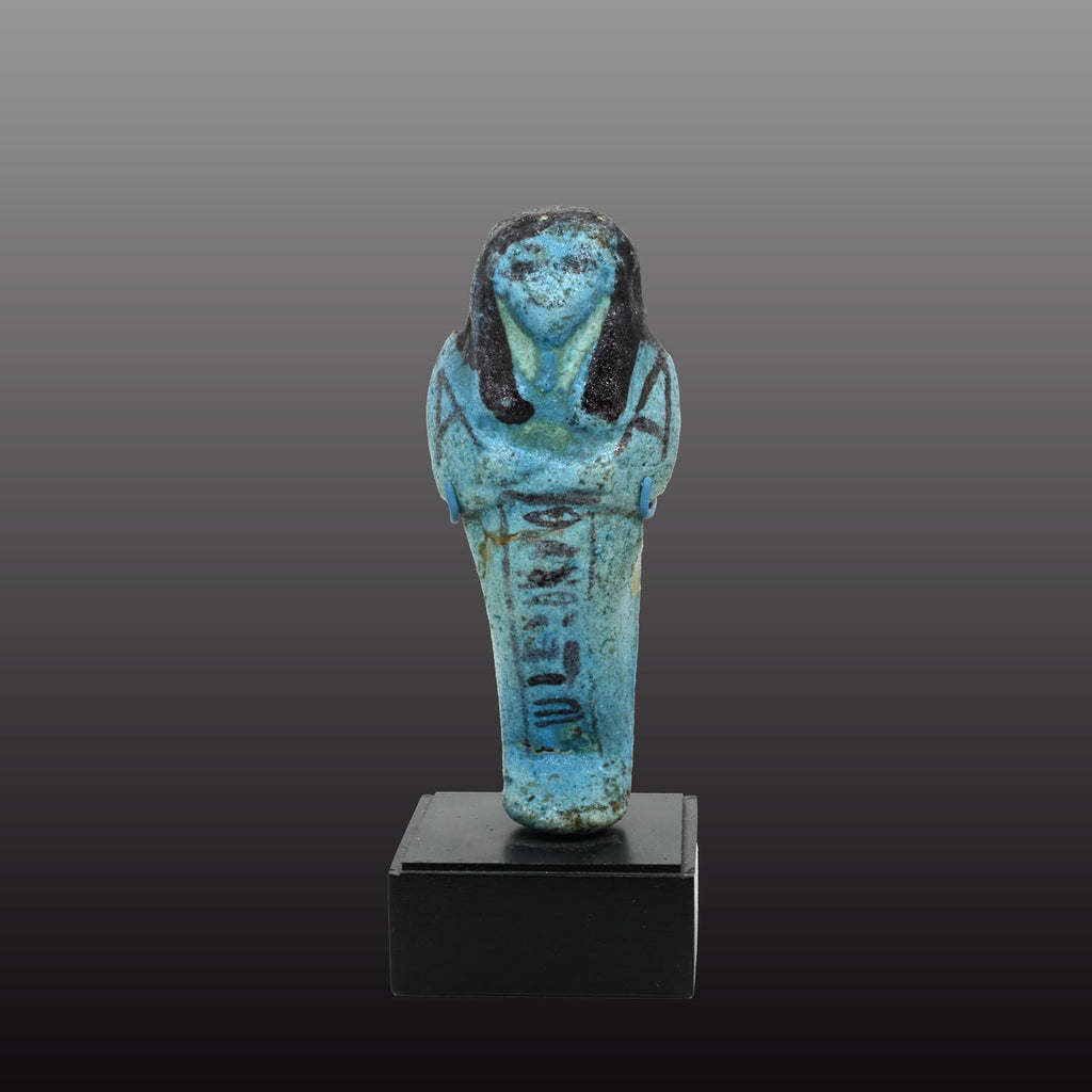 An Egyptian bright blue glazed shabti for Meret-Amun, 21st Dynasty, Thebes, Deir el Bahri Cache II, ca. 990 - 970 BCE