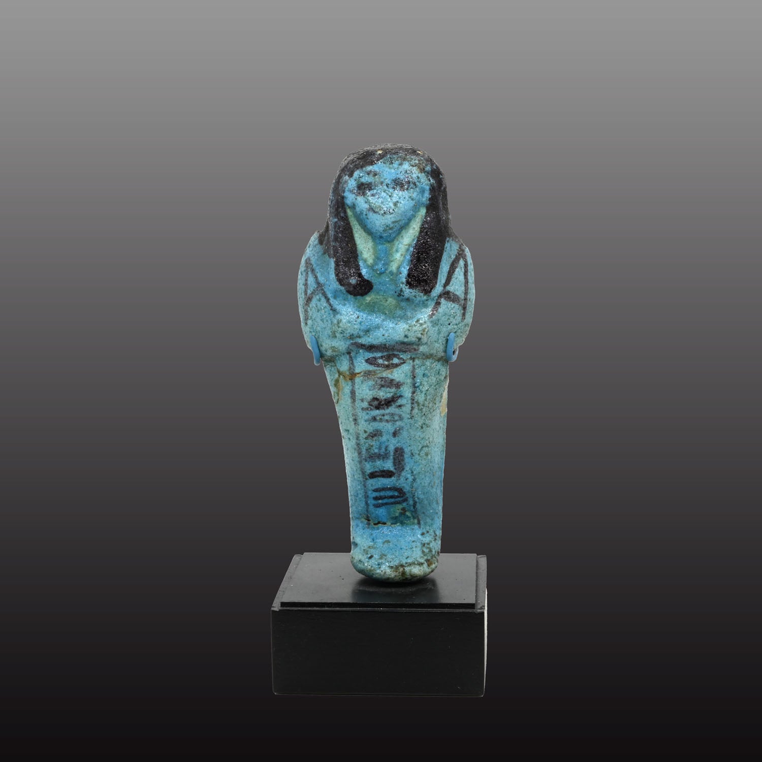 An Egyptian bright blue glazed shabti for Meret-Amun, 21st Dynasty, Thebes, Deir el Bahri Cache II, ca. 990 - 970 BCE