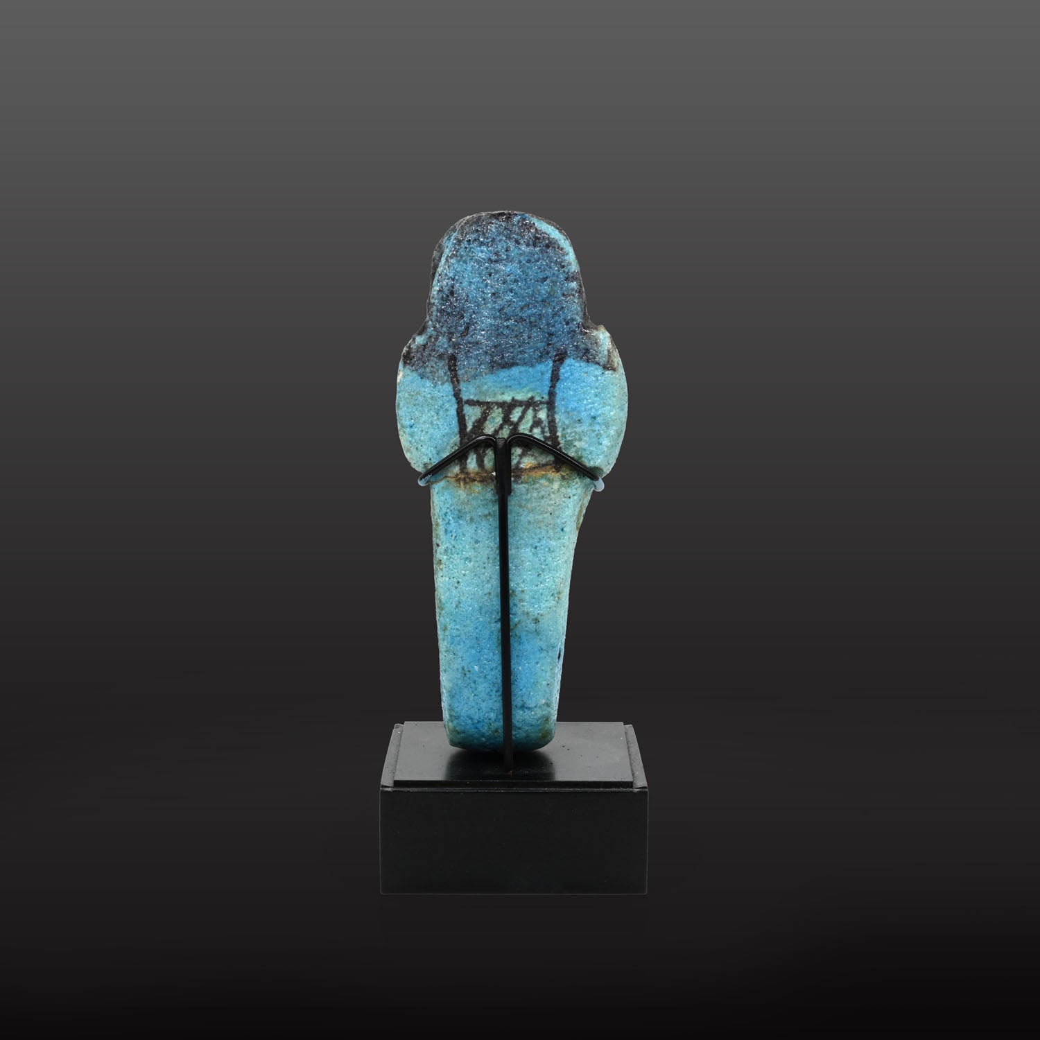 An Egyptian bright blue glazed shabti for Meret-Amun, 21st Dynasty, Thebes, Deir el Bahri Cache II, ca. 990 - 970 BCE