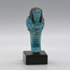 An Egyptian bright blue glazed shabti for Meret-Amun, 21st Dynasty, Thebes, Deir el Bahri Cache II, ca. 990 - 970 BCE