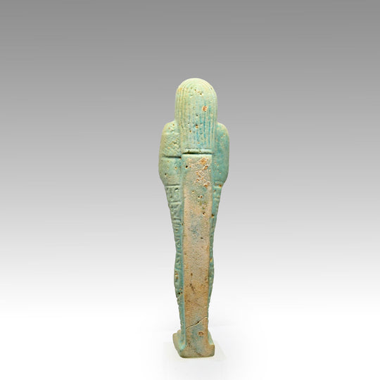 An Egyptian Green Glazed Shabti for the scribe Hapmen, 26th Dynasty, ca. 664 - 525 BCE
