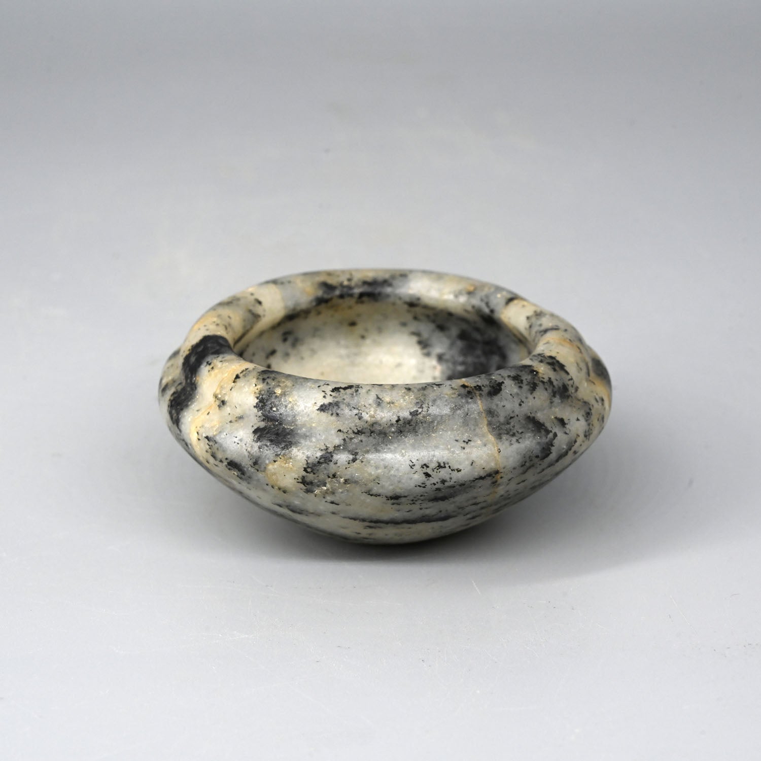 A fine Egyptian Anorthosite Gneiss Bowl, early Dynastic Period, Dynasty 2, ca. 2770 - 2649 BCE