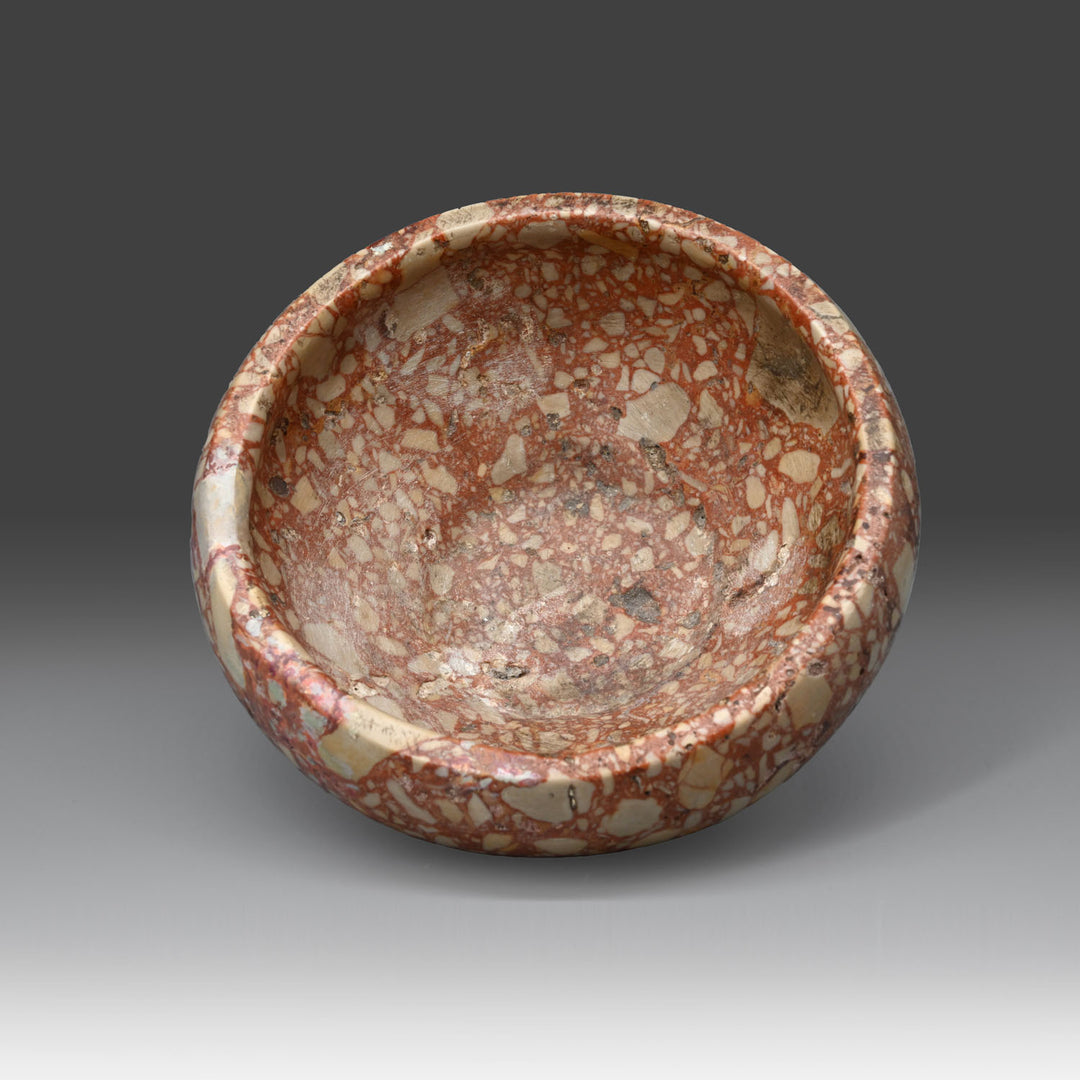 A fine Egyptian Early Dynastic Breccia Bowl, Dynasty 1, ca. 2920 - 2649 BCE