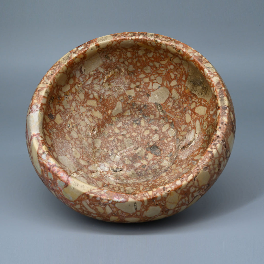 A fine Egyptian Early Dynastic Breccia Bowl, Dynasty 1, ca. 2920 - 2649 BCE