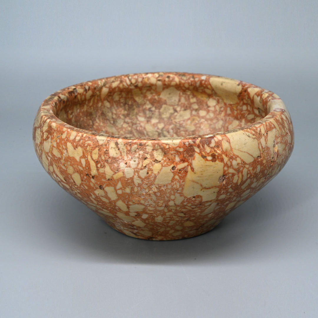 A fine Egyptian Early Dynastic Breccia Bowl, Dynasty 1, ca. 2920 - 2649 BCE