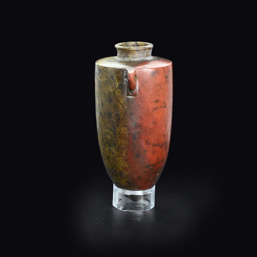 An exceptional Egyptian Red Jasper Torpedo Vase, Third Intermediate Period, ca. 1069 - 664 BCE