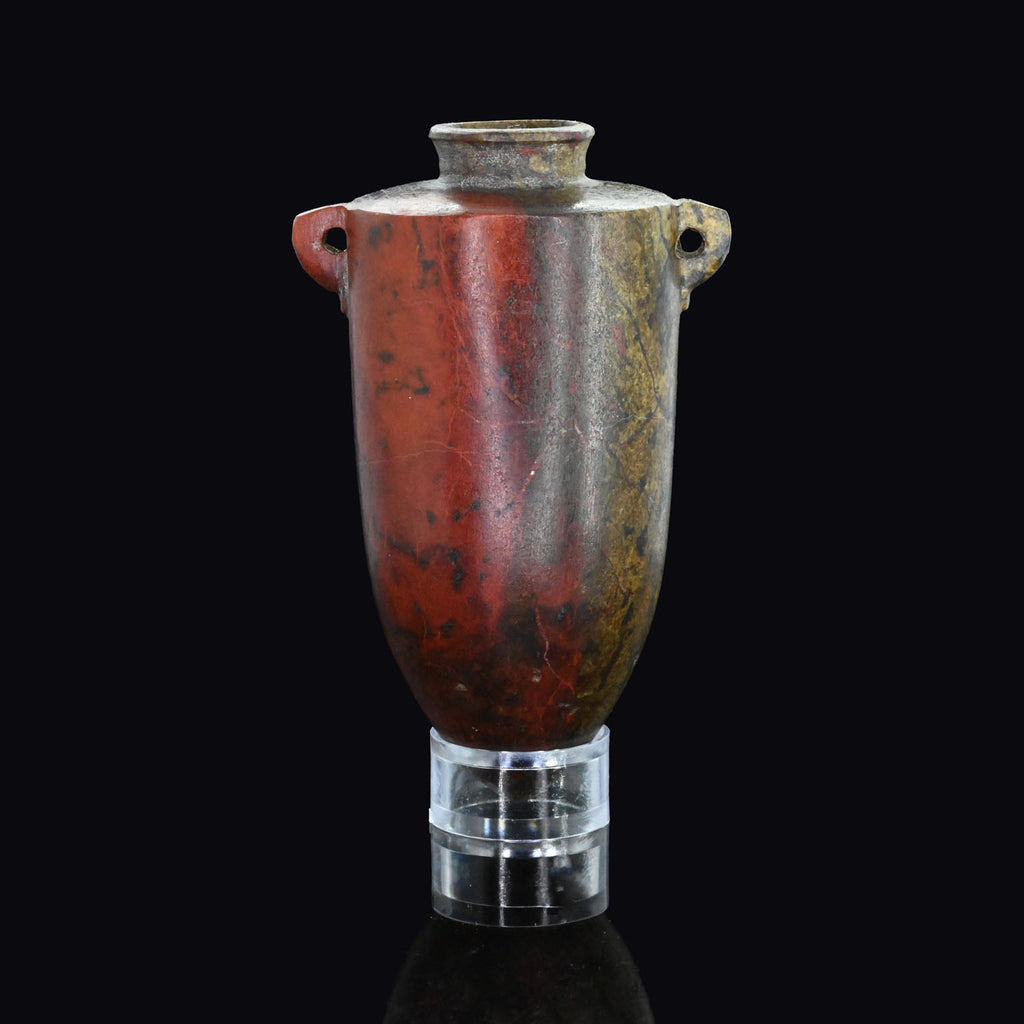 An exceptional Egyptian Red Jasper Torpedo Vase, Third Intermediate Period, ca. 1069 - 664 BCE