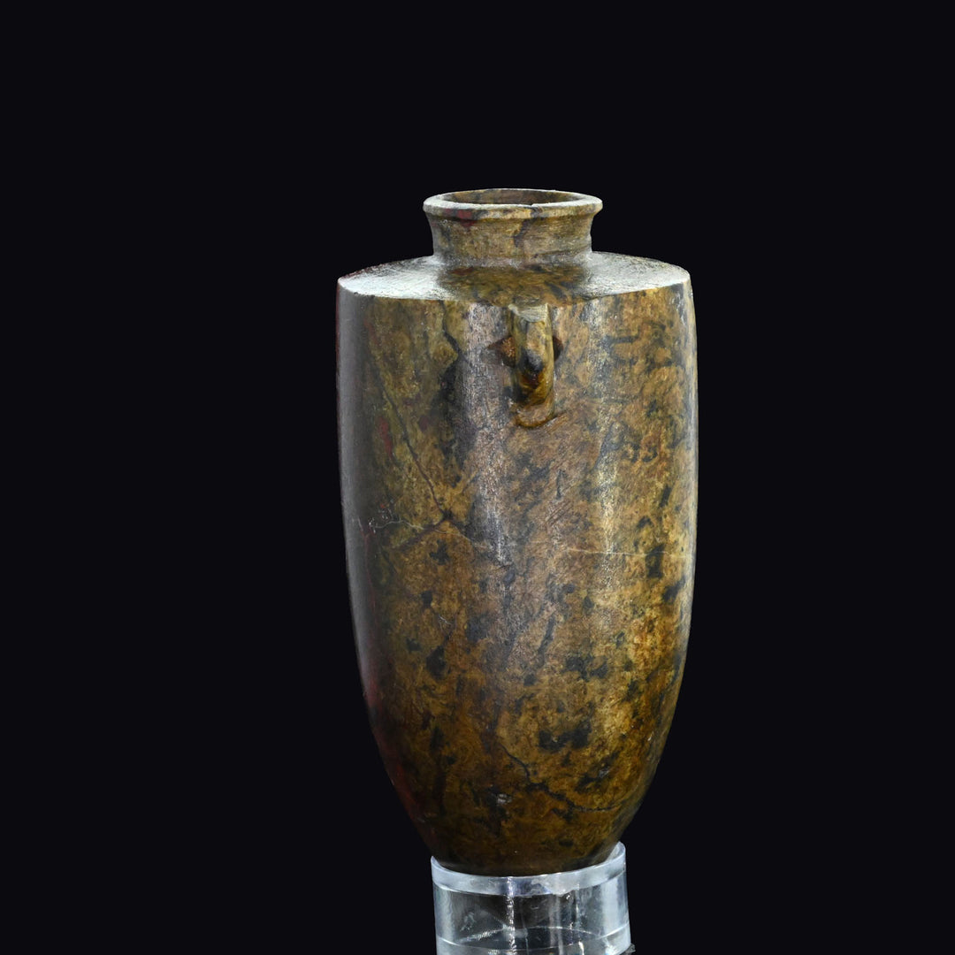 An exceptional Egyptian Red Jasper Torpedo Vase, Third Intermediate Period, ca. 1069 - 664 BCE