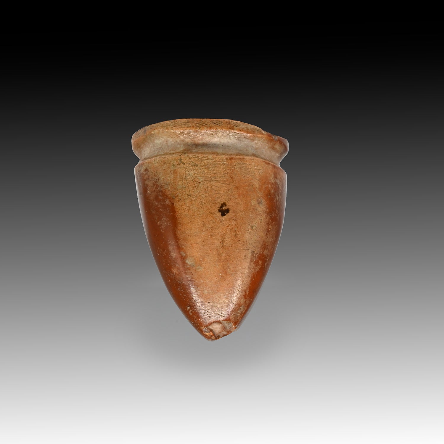 A miniature Egyptian Breccia Model Vessel, Old Kingdom, ca. 2575 - 2134 BCE