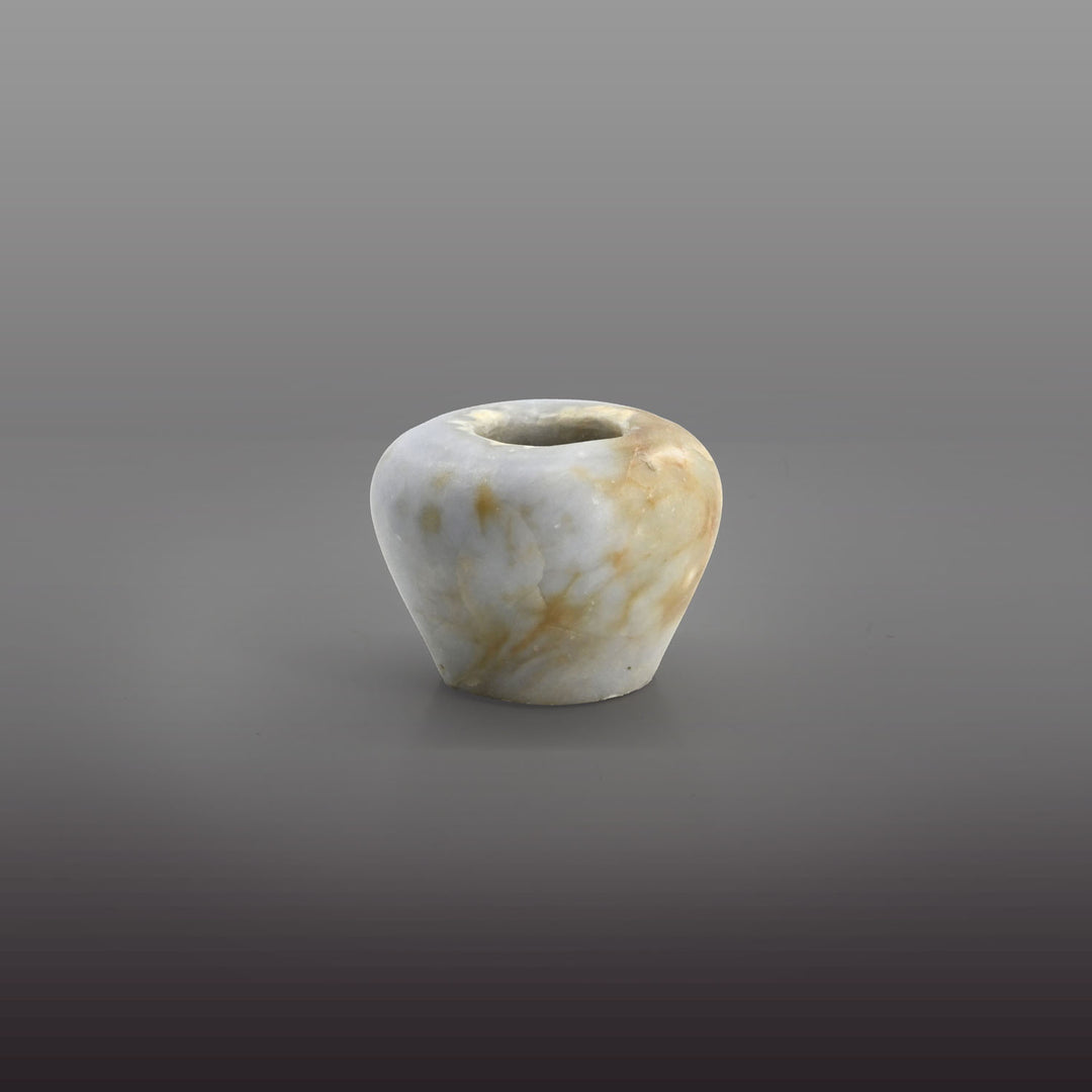 An elegant Egyptian Anhydrite Kohl Vessel, Middle Kingdom, XII Dynasty, not after 1786 BCE