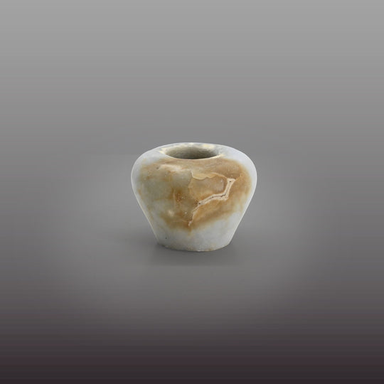 An elegant Egyptian Anhydrite Kohl Vessel, Middle Kingdom, XII Dynasty, not after 1786 BCE