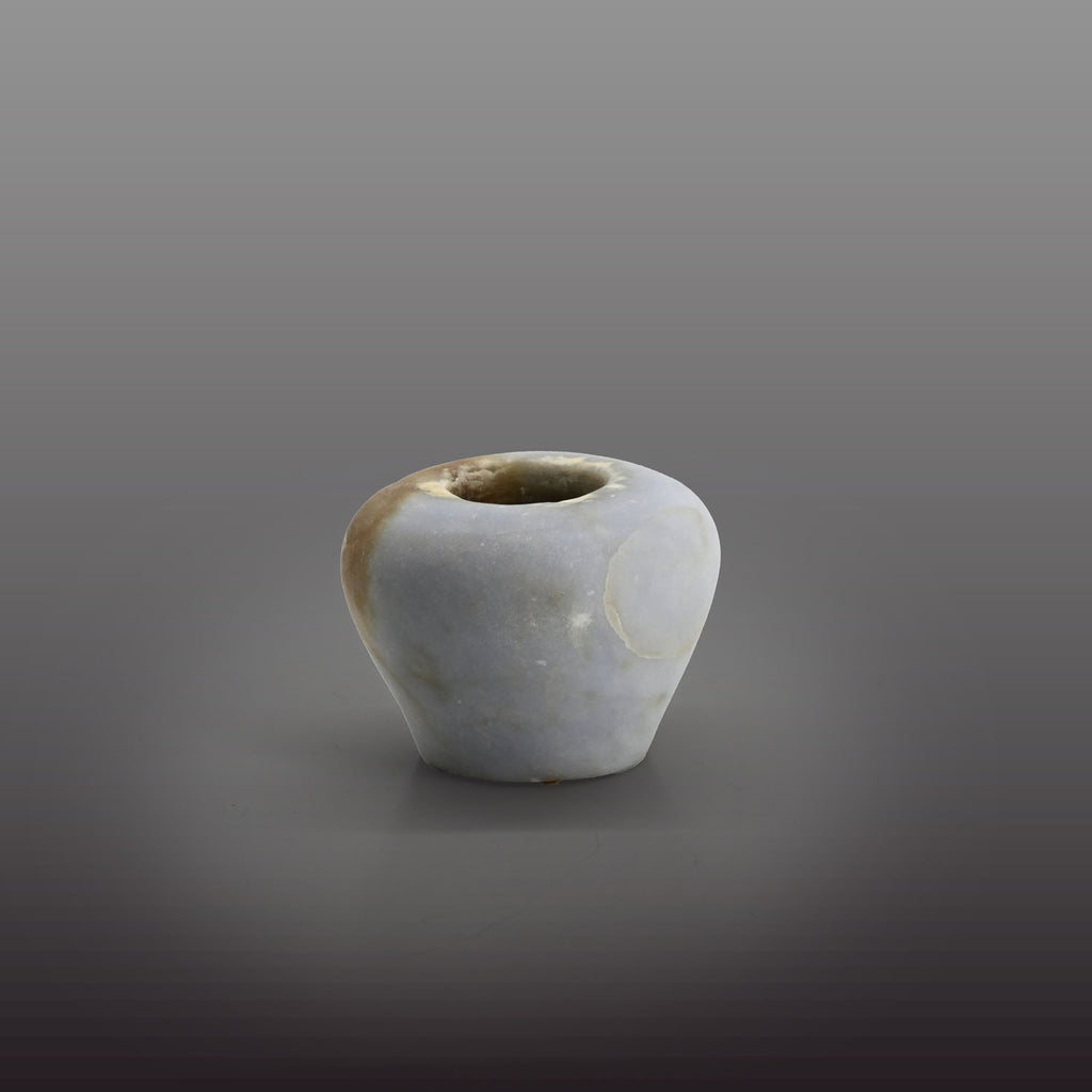 An elegant Egyptian Anhydrite Kohl Vessel, Middle Kingdom, XII Dynasty, not after 1786 BCE