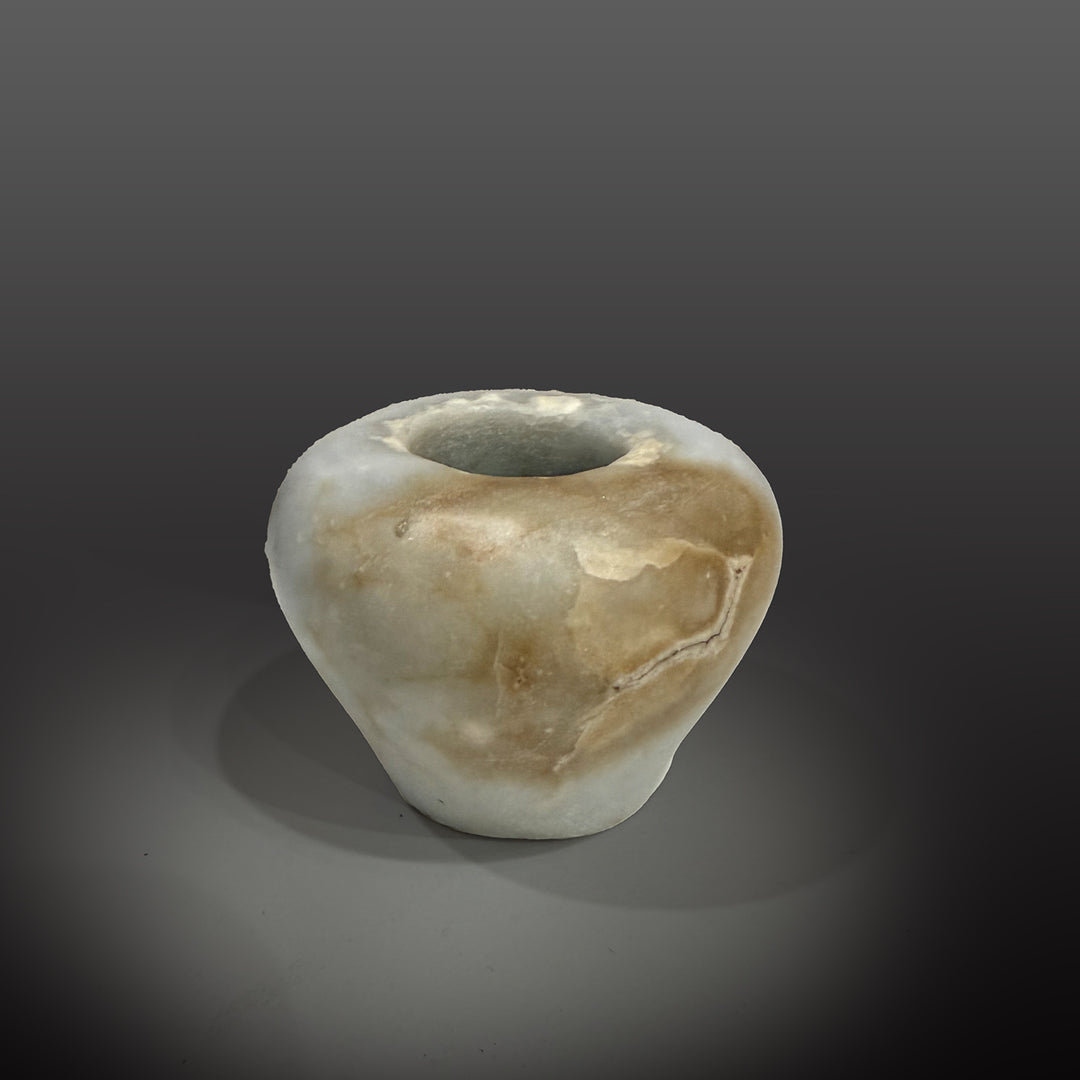 An elegant Egyptian Anhydrite Kohl Vessel, Middle Kingdom, XII Dynasty, not after 1786 BCE