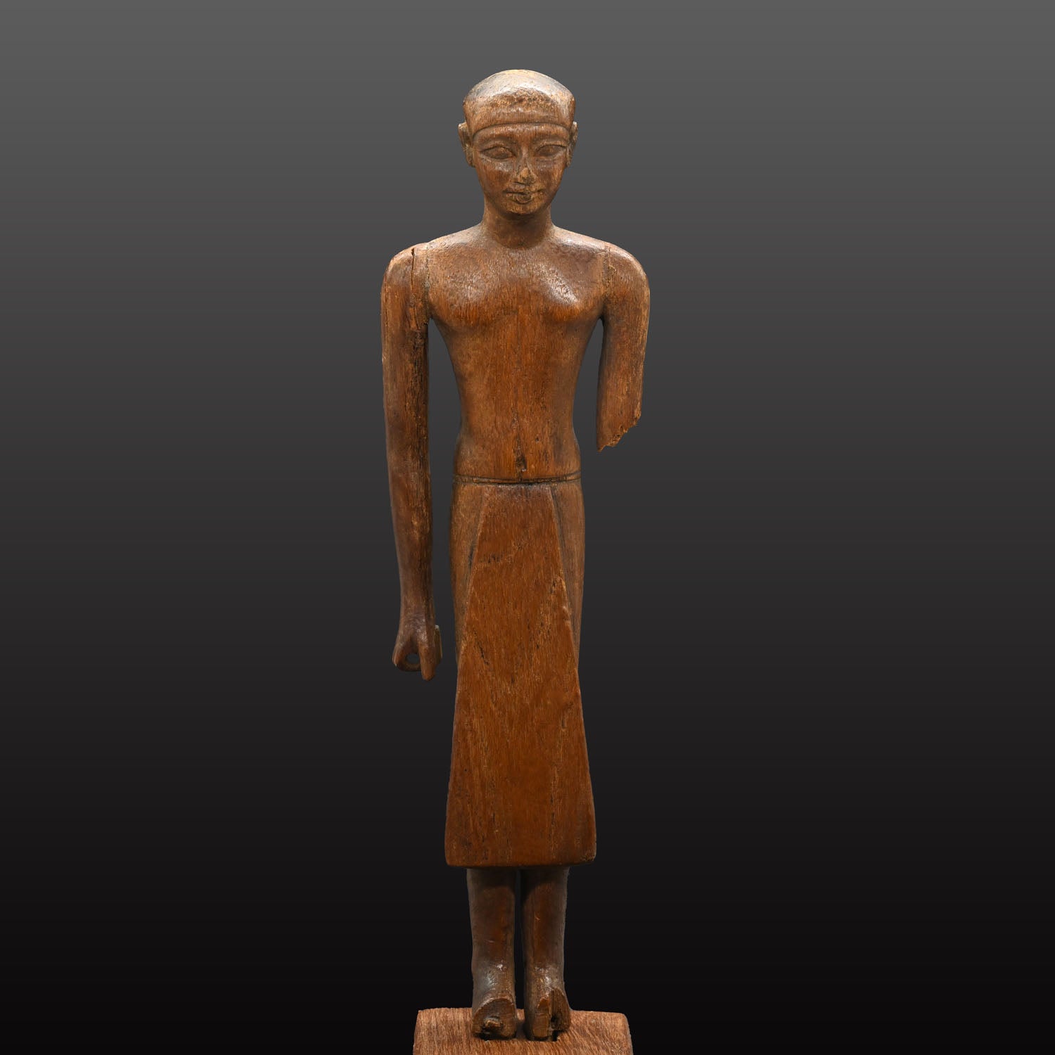 A Fine Egyptian Wooden Standing Dignitary Figure, Middle Kingdom, 11th - 12th Dynasty, ca. 2030 - 1802 BCE