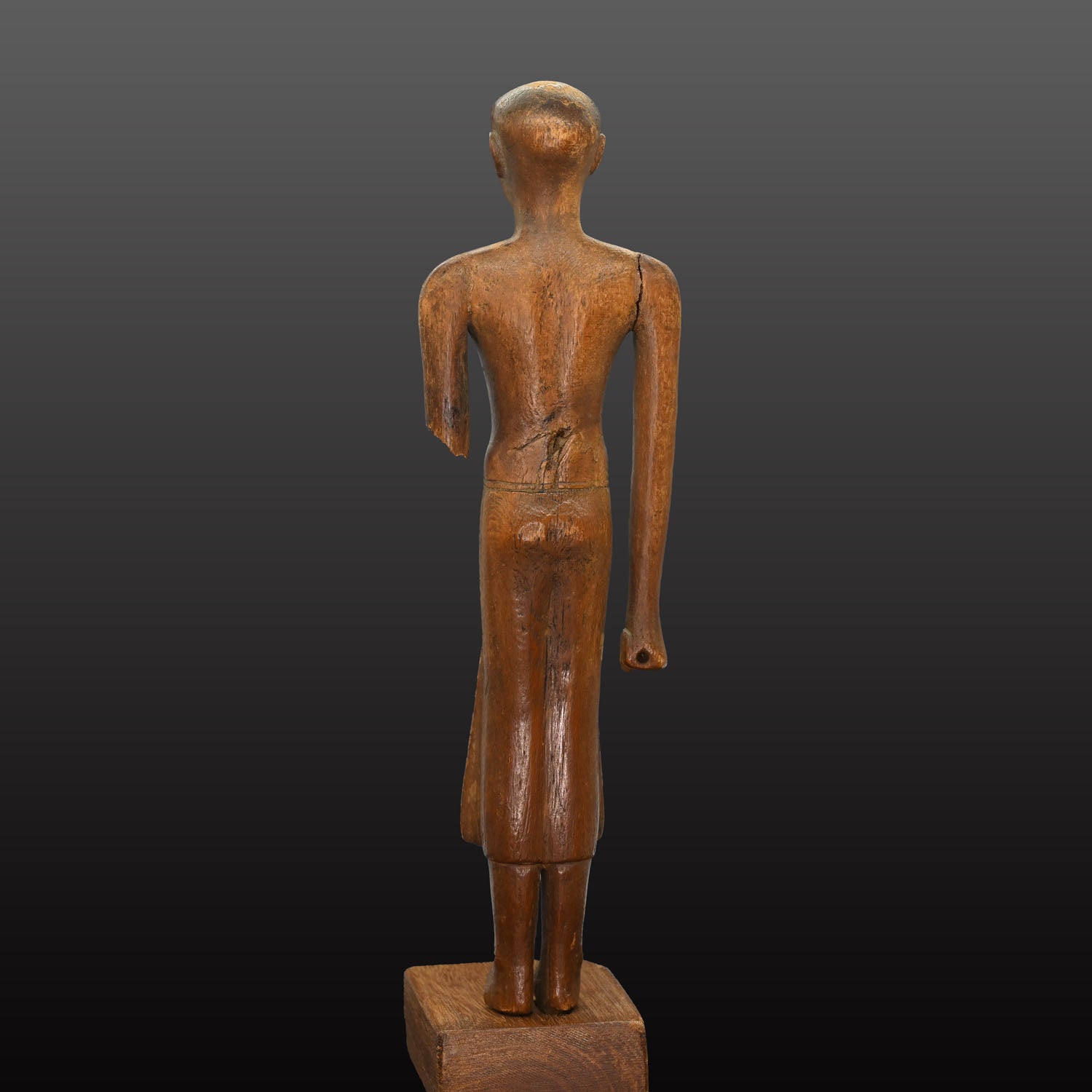 A Fine Egyptian Wooden Standing Dignitary Figure, Middle Kingdom, 11th - 12th Dynasty, ca. 2030 - 1802 BCE