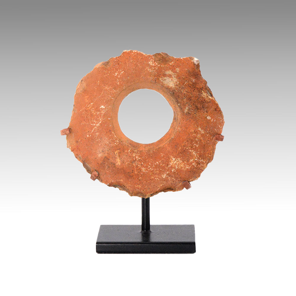 An Egyptian Pre-Dynastic Flint Mace Head, Pre-Dynastic Period, ca. 4th millennium BCE