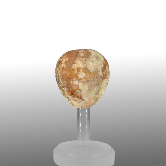 An Egyptian Breccia Mace Head, Old Kingdom, ca. 2700 - 2500 BCE