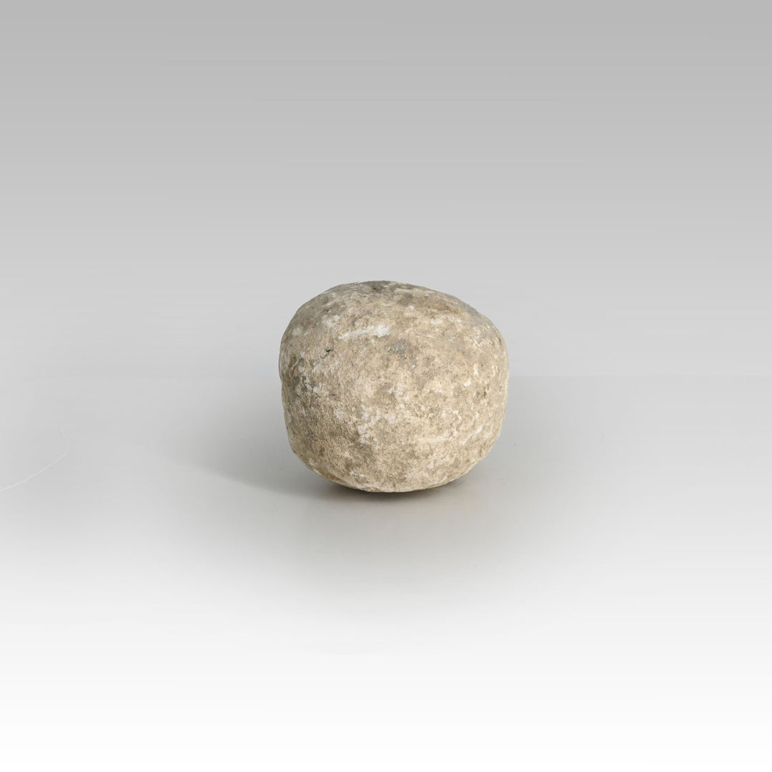 An Egyptian Limestone Stone Pounder, Old Kingdom, ca. 2543 - 2120 BCE