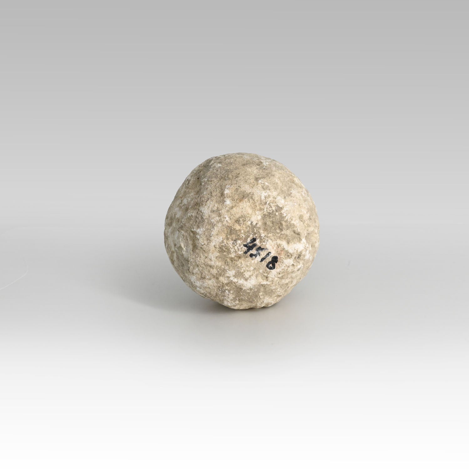 An Egyptian Limestone Stone Pounder, Old Kingdom, ca. 2543 - 2120 BCE