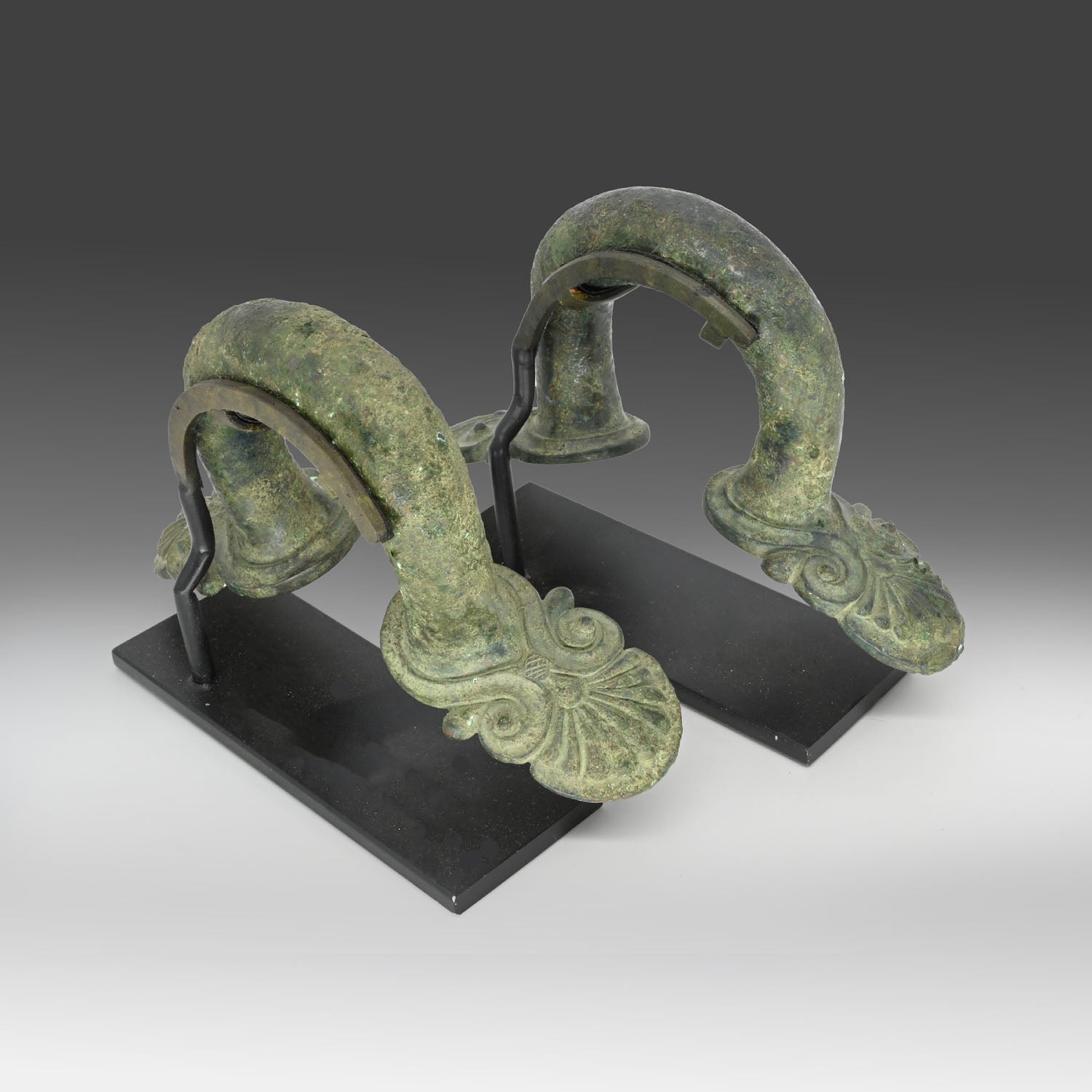 A pair of Greek bronze Hydria Handles, Classical period, ca. 5th century BCE